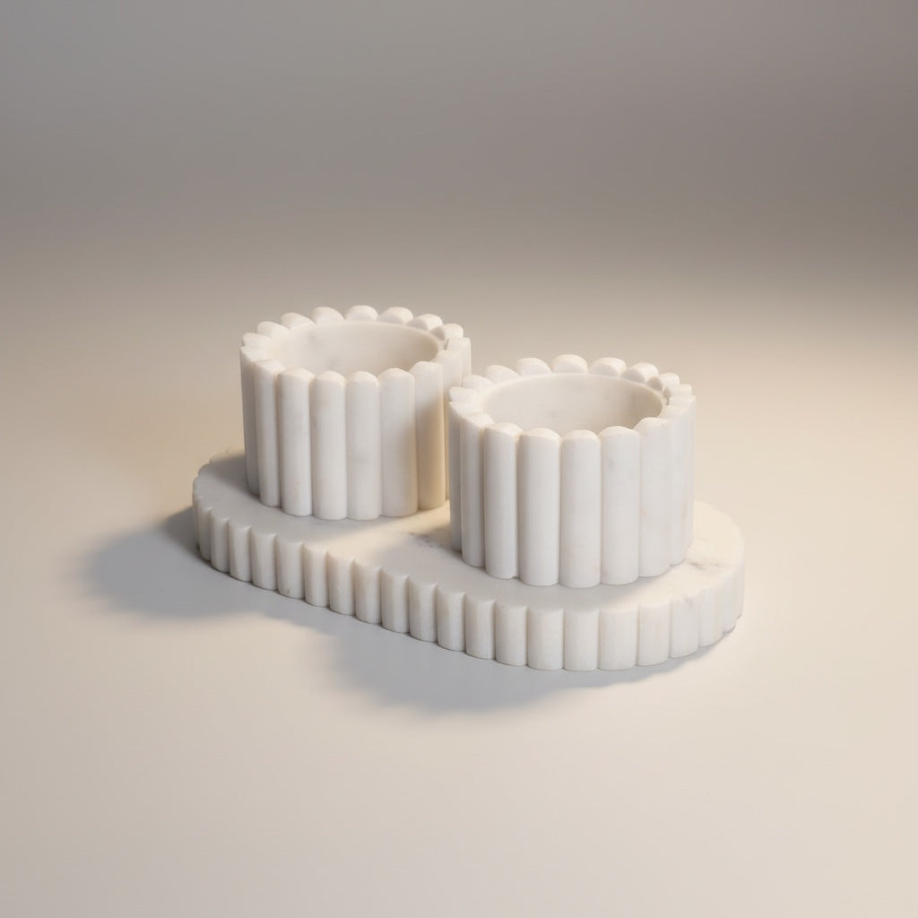 Indian white marble fluted pinch pot set — two ribbed cylindrical cups with scalloped rim on matching fluted oval tray, angled hero shot
