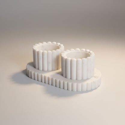 Indian white marble fluted pinch pot set — two ribbed cylindrical cups with scalloped rim on matching fluted oval tray, angled hero shot