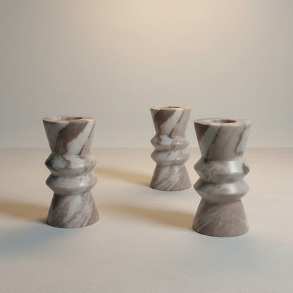 Toronto marble candle holder — close-up of twisted stacked rings and natural stone veining pattern