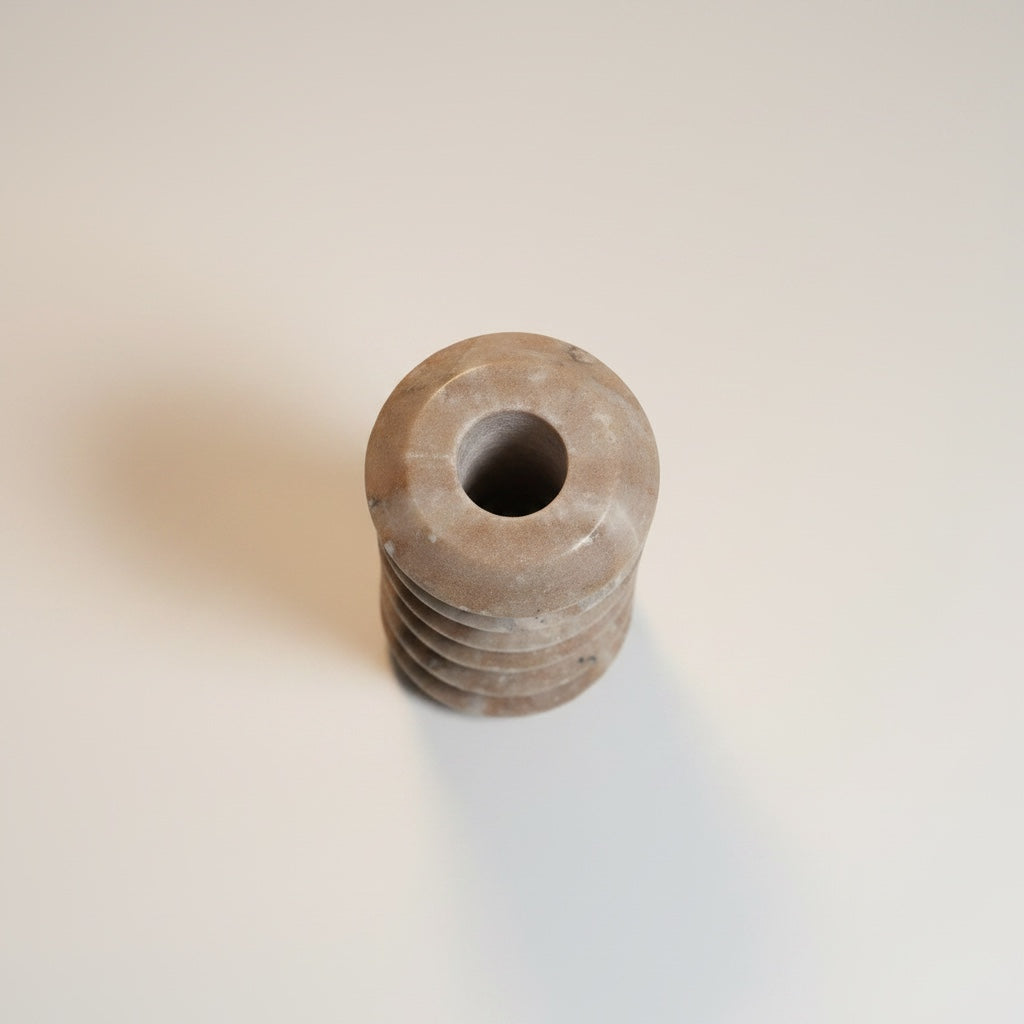 Morchana marble ribbed taper holder — side view showing horizontal ring texture and matte stone surface