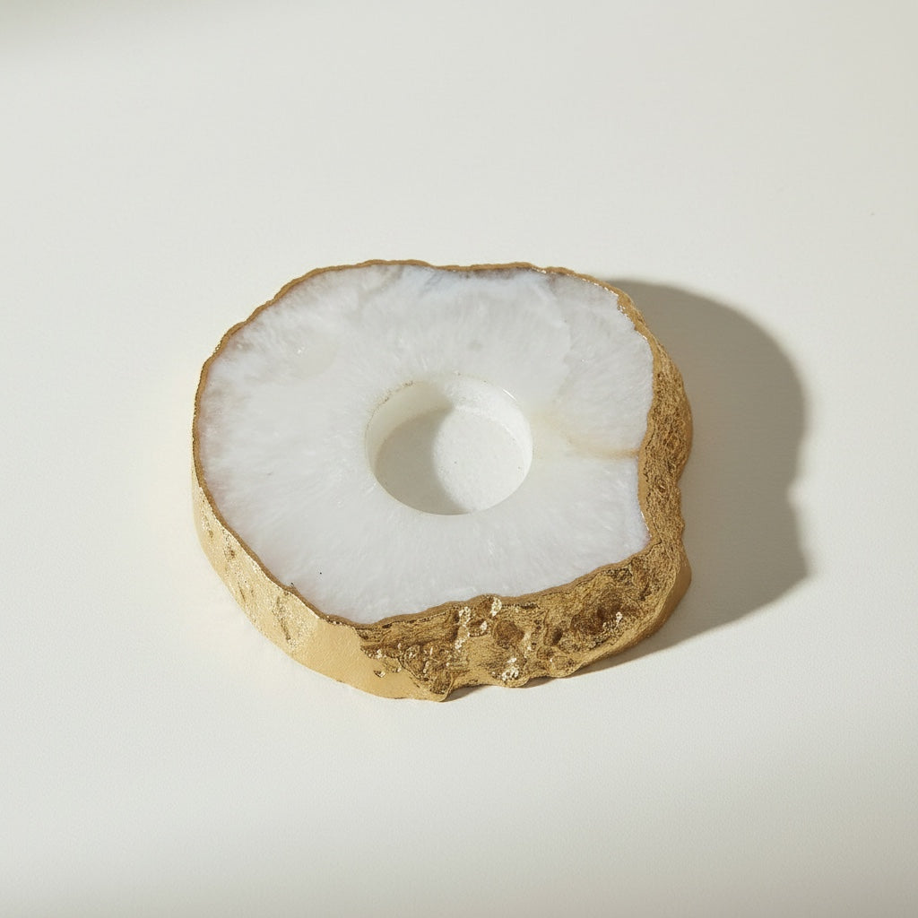 Agate stone taper candle holder gold foil edge — angled view showing translucent white agate and central taper well