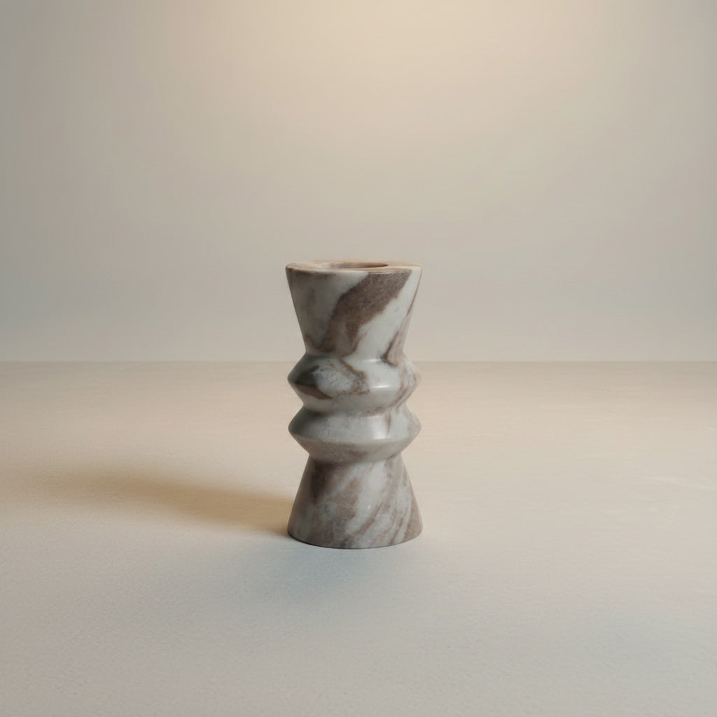 Toronto marble twisted form taper candle holder — angled view showing sculptural ribbed silhouette