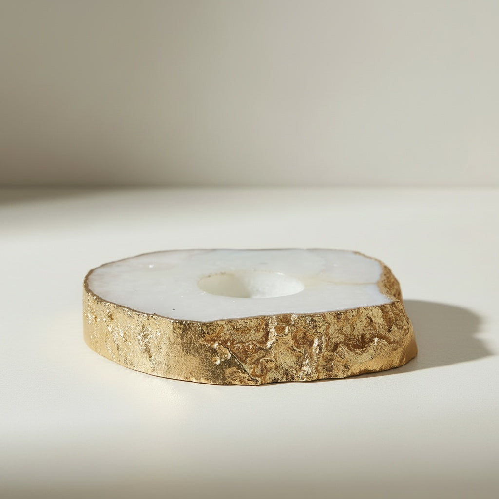 White agate disc candle holder with gold foil edge — side view showing gold leaf border and natural stone slice