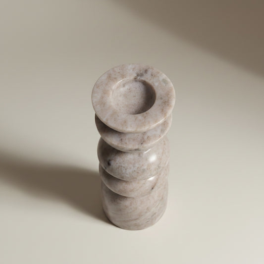 Morchana marble totem taper candle holder — side view showing stacked disc silhouette and stone texture