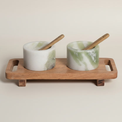 Himalayan green marble pinch pot set — front view showing cylindrical cups with green cloud veining on rectangular footed acacia tray with handle cutouts